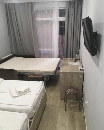 Фото номера Стандарт 4-местный Гостевой дом Sandro Palace г. Сочи 2
