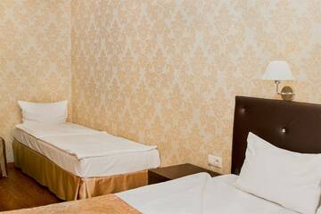 Фото номера Семейный с завтраком и парковкой Отель Марианна г. Сочи 5