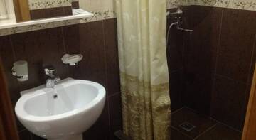 Фото номера Стандартный двухместный номер с 1 кроватью Гостевой дом Мини-гостиница Елизавета г. Сочи 7