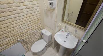 Фото номера Апартаменты с 2 спальнями Апартаменты Apartamenty na Moskovskoy г. Сочи 24