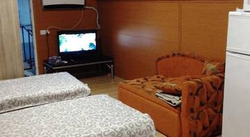 Фото номера Четырехместный номер Гостевой дом Guesthouse-apartment Dzhigitskaya г. Сочи 5