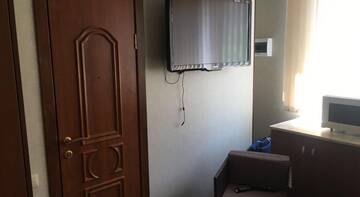 Фото номера Двухместный номер с 2 отдельными кроватями Гостиница Navaginskaya г. Сочи 3