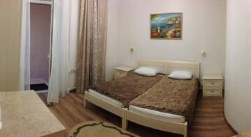 Фото номера Стандартный двухместный номер с 2 отдельными кроватями Гостевой дом Векар  г. Сочи 5