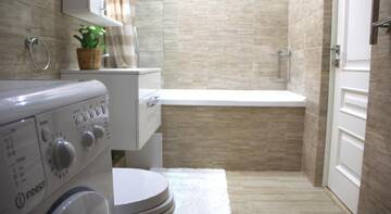 Фото номера Апартаменты Делюкс Гостиница Alpha Apartments Voykova г. Сочи 30