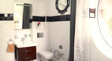 Фото номера Апартаменты с террасой Гостиница Alpha Apartments Voykova г. Сочи 16