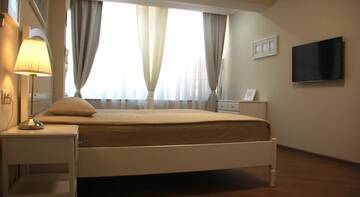 Фото номера Апартаменты Делюкс Гостиница Alpha Apartments Voykova г. Сочи 24