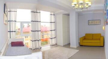 Фото номера Апартаменты с террасой Гостиница Alpha Apartments Voykova г. Сочи 8