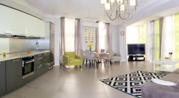 Фото номера Апартаменты с террасой Гостиница Alpha Apartments Voykova г. Сочи 17