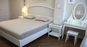 Фото номера Апартаменты Делюкс Гостиница Alpha Apartments Voykova г. Сочи 8