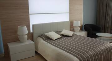 Фото номера Апартаменты с 2 спальнями Гостиница Apartsochi Premium Апартаменты г. Сочи 11