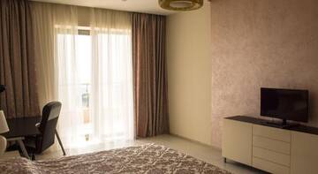 Фото номера Апартаменты Делюкс Гостиница Apartsochi Premium Апартаменты г. Сочи 5