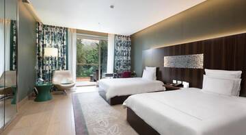 Фото номера Двухместный номер Swiss Advantage с 2 отдельными кроватями Гостиница Swissоtel Resort Сочи Камелия г. Сочи 5