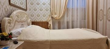 Фото номера Стандартный двухместный номер Гостиница Гостевой Дом Золотая Миля г. Сочи 5
