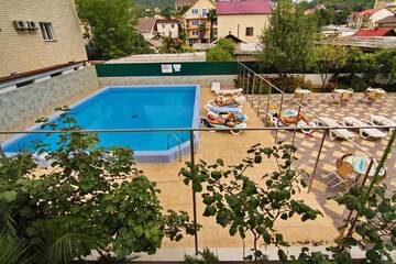 Фото номера Стандартный семейный номер Гостиница Lazur Guest House г. Сочи 2