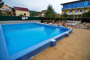 Фото номера Стандартный семейный номер Гостиница Lazur Guest House г. Сочи 15