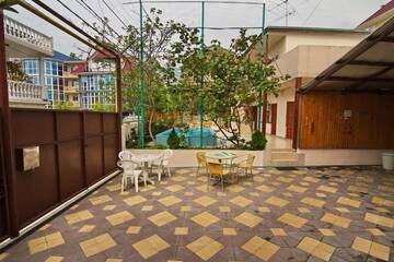 Фото номера Стандартный семейный номер Гостиница Lazur Guest House г. Сочи 13