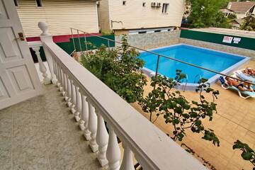 Фото номера Стандартный семейный номер Гостиница Lazur Guest House г. Сочи 14
