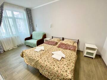 Фото номера Трехместный номер Гостиница Lazur Guest House г. Сочи 18