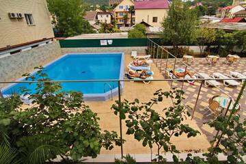 Фото номера Стандартный семейный номер Гостиница Lazur Guest House г. Сочи 10