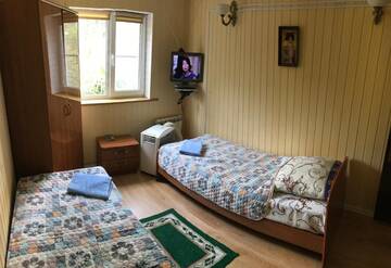 Фото номера Двухместный номер с 1 кроватью или 2 отдельными кроватями, вид на сад Гостиница Гостевой дом на Улице Учительская г. Сочи 13