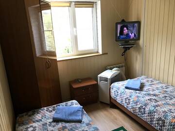 Фото номера Двухместный номер с 1 кроватью или 2 отдельными кроватями, вид на сад Гостиница Гостевой дом на Улице Учительская г. Сочи 12