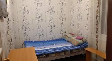 Фото номера Четырехместный номер эконом-класса Гостевой дом Апартаменты на Комсомольской г. Сочи 2
