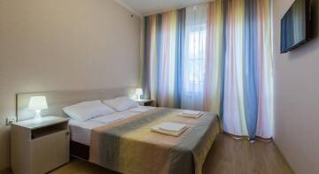 Фото номера Классический семейный номер с видом на море Гостиница Guest House Nika г. Сочи 3