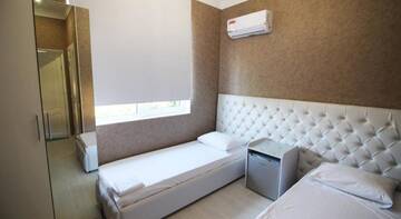 Фото номера Двухместный номер с 2 отдельными кроватями Гостиница Guest house Nadegda г. Сочи 2