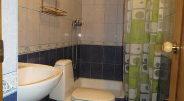 Фото номера Трехместный номер с видом на горы Гостиница Guest house Kiwi г. Сочи 4