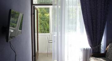 Фото номера Апартаменты Апартаменты Apartment On Kurortnyi Prospekt г. Сочи 4