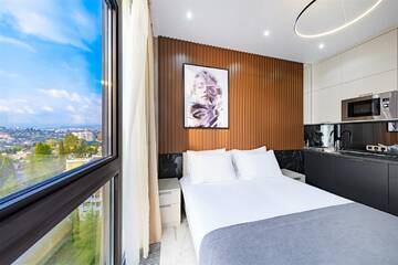 Фото номера Апартаменты Studio без балкона Апарт-отели Апарт-отель МЕТРОПОЛЬ г. Сочи 7