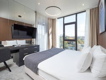 Фото номера Апартаменты Luxe с балконом Апарт-отели Апарт-отель МЕТРОПОЛЬ г. Сочи 5