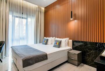 Фото номера Апартаменты Студия Garden Апарт-отели Апарт-отель МЕТРОПОЛЬ г. Сочи 3
