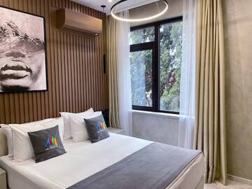 Фото номера Апартаменты Luxe (2 спальни) 1 этаж, без балкона Апарт-отели Апарт-отель МЕТРОПОЛЬ г. Сочи 5