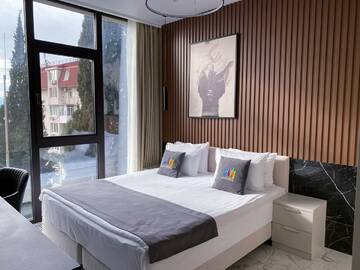 Фото номера Апартаменты Luxe (2 спальни) 1 этаж, без балкона Апарт-отели Апарт-отель МЕТРОПОЛЬ г. Сочи 3