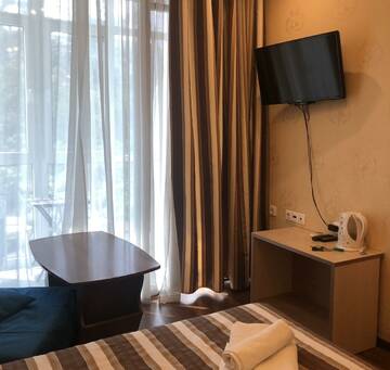 Фото номера Номер студия с 3 односпальными кроватями Апартаменты Golden Holiday Apartments г. Сочи 8
