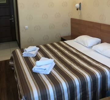 Фото номера Номер студия с 3 односпальными кроватями Апартаменты Golden Holiday Apartments г. Сочи 2