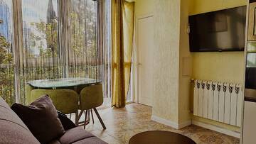 Фото номера 2-комнатный номер полулюкс Апартаменты Golden Holiday Apartments г. Сочи 21