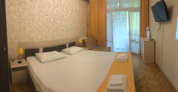 Фото номера Апартаменты с видом на сад Гостиница Joy Apartments г. Сочи 2