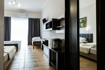 Фото номера Семейный номер Гостиница Mini Hotel Parus г. Сочи 9