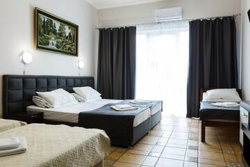 Фото номера Семейный номер Гостиница Mini Hotel Parus г. Сочи 7