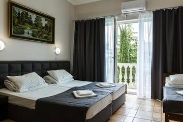 Фото номера Семейный номер Гостиница Mini Hotel Parus г. Сочи 4