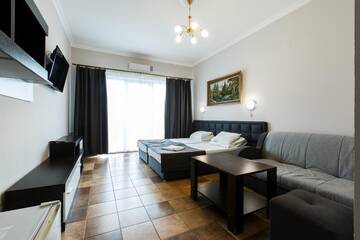 Фото номера Люкс 4 местный Гостиница Mini Hotel Parus г. Сочи 9