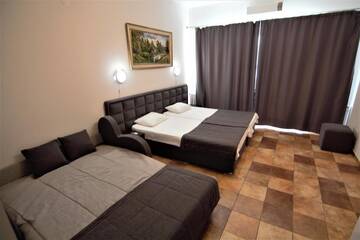 Фото номера Люкс 4 местный Гостиница Mini Hotel Parus г. Сочи 3