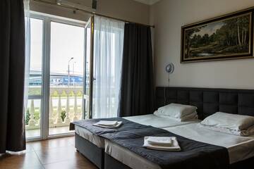 Фото номера Люкс 4 местный Гостиница Mini Hotel Parus г. Сочи 5