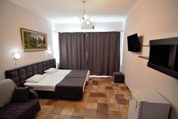 Фото номера Люкс 4 местный Гостиница Mini Hotel Parus г. Сочи 2